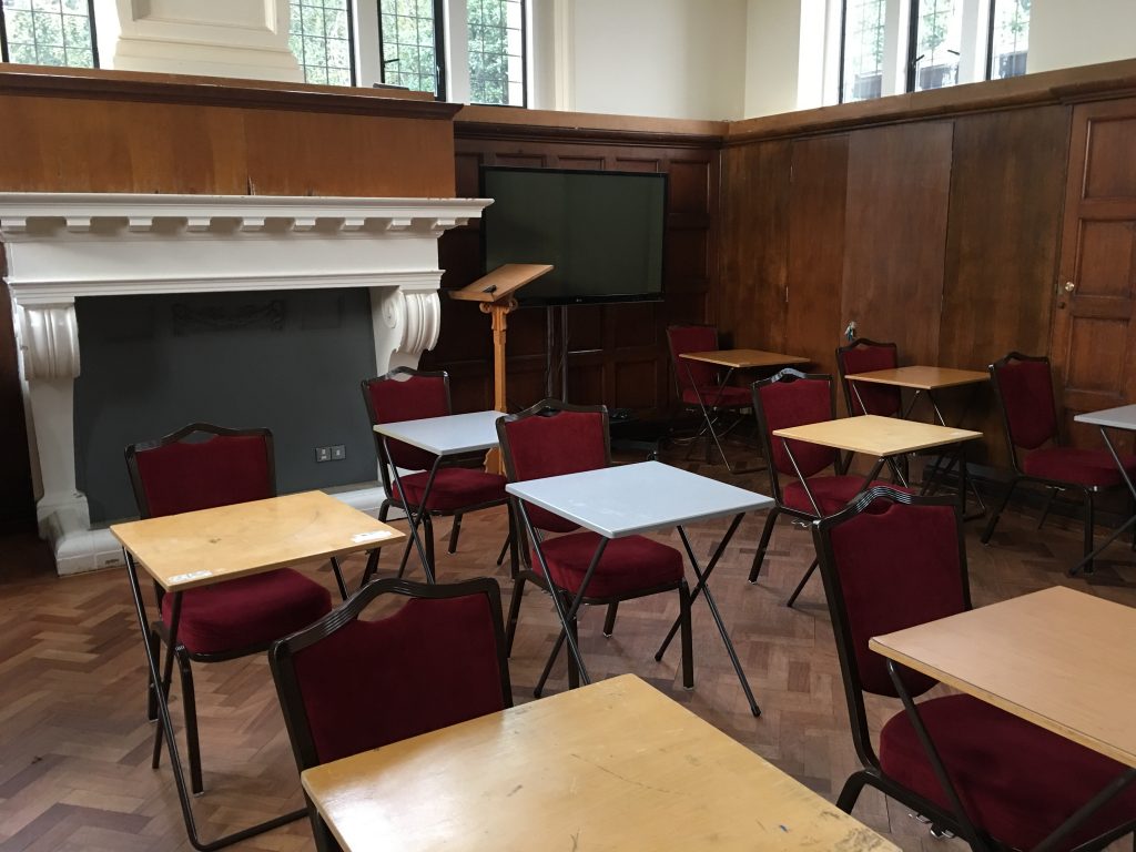 a dining room table in front of a window