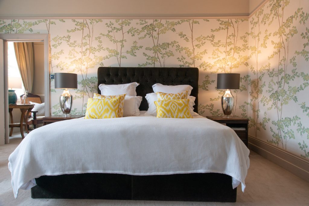 a bedroom with a bed in a hotel room