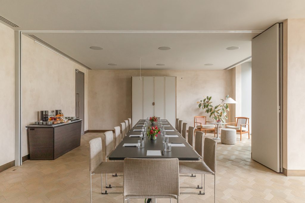 a kitchen with a table in a room