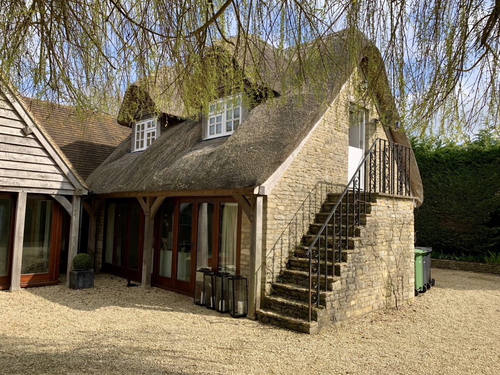 a house with trees in the background