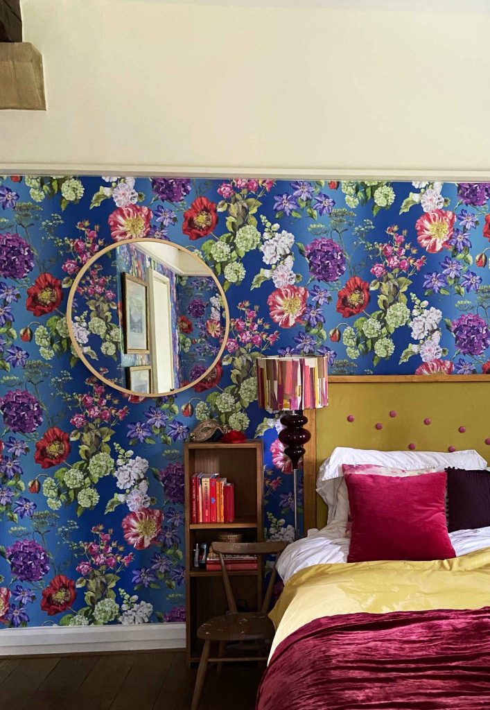 a bedroom with a bed in a room