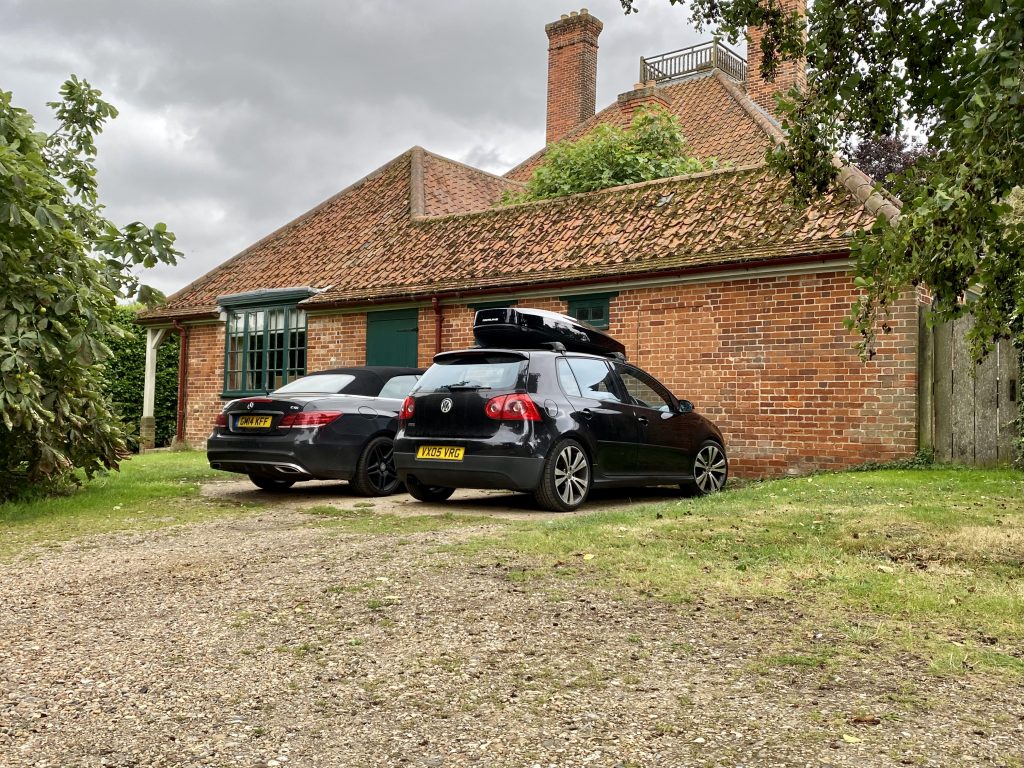 a car parked in front of a house