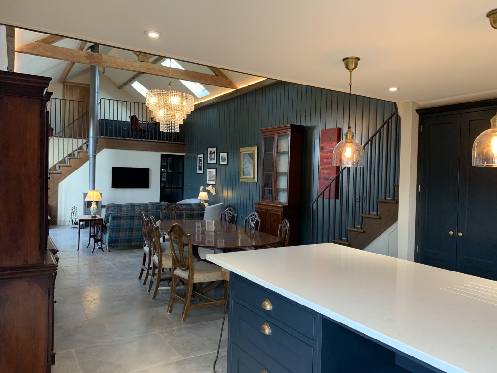 a kitchen with a dining room table