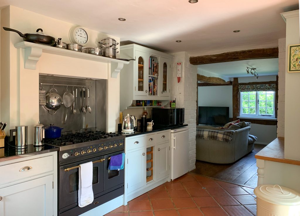 a kitchen filled with lots of furniture