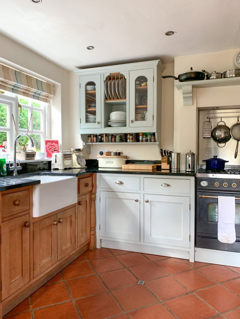 a kitchen with a sink and a window