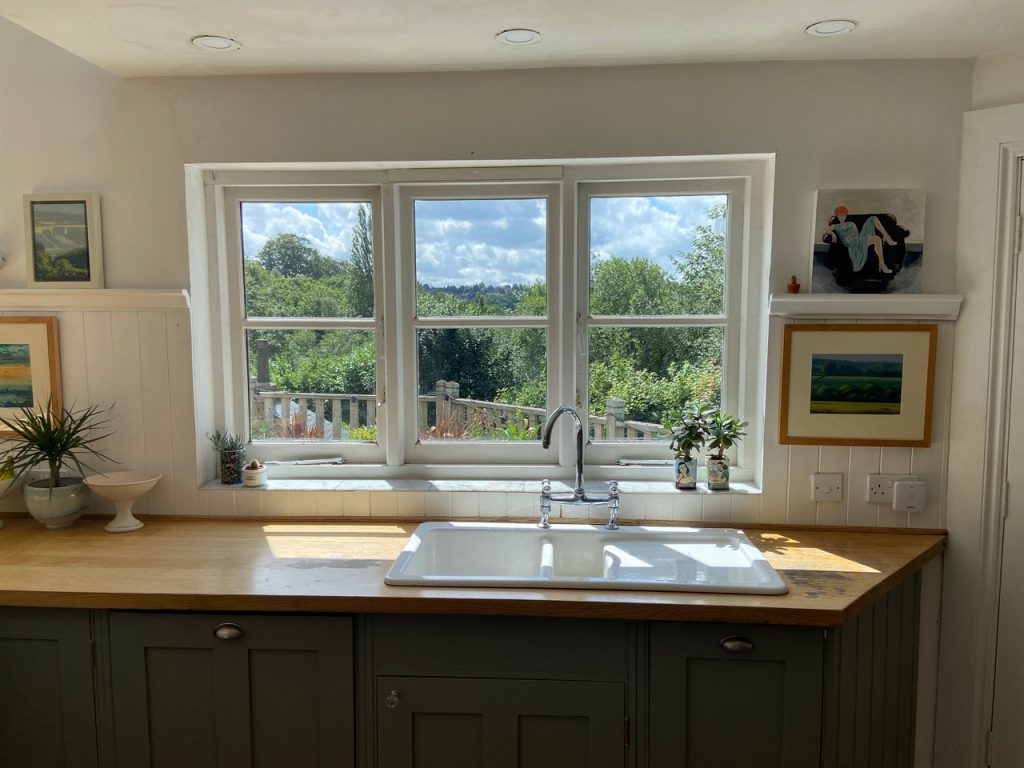 a kitchen with a sink and a window