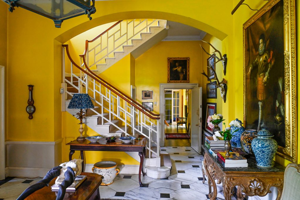 a living room filled with furniture and a fireplace