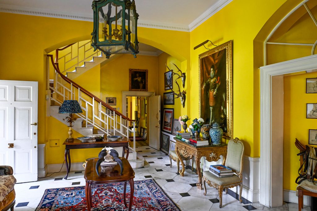 a room filled with furniture and a fireplace