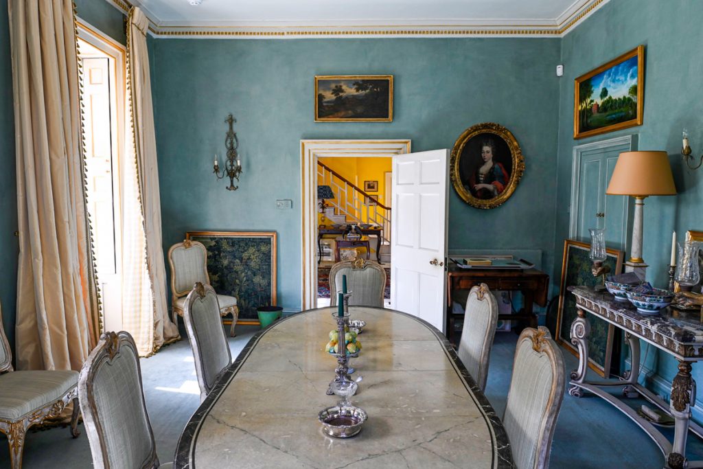 a living room filled with furniture and a fire place
