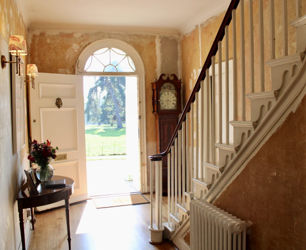 a room filled with furniture and a fire place