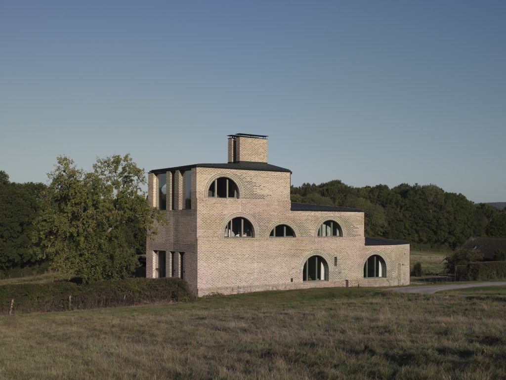 a castle on top of a grass covered field