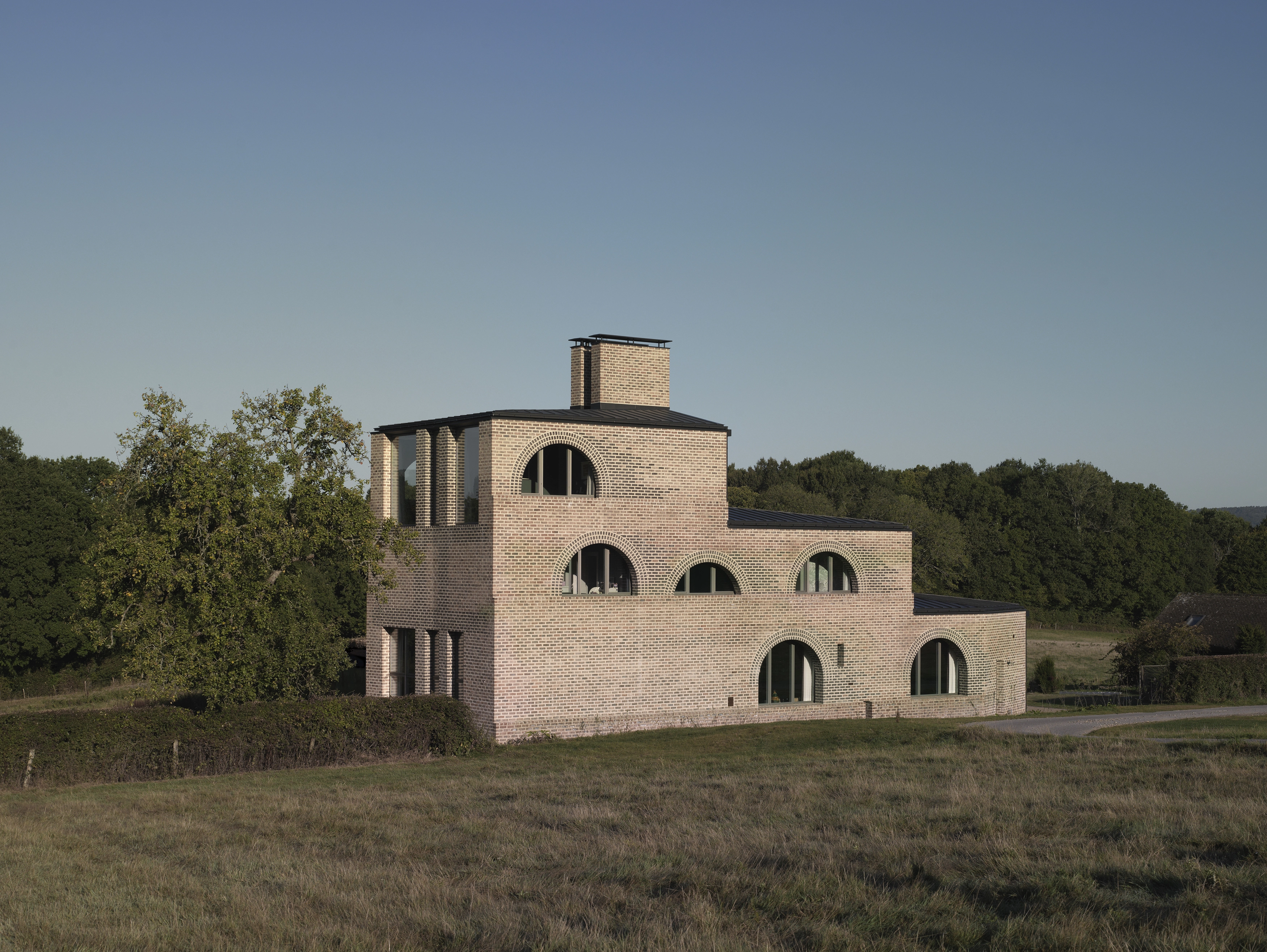 a castle on top of a grass covered field