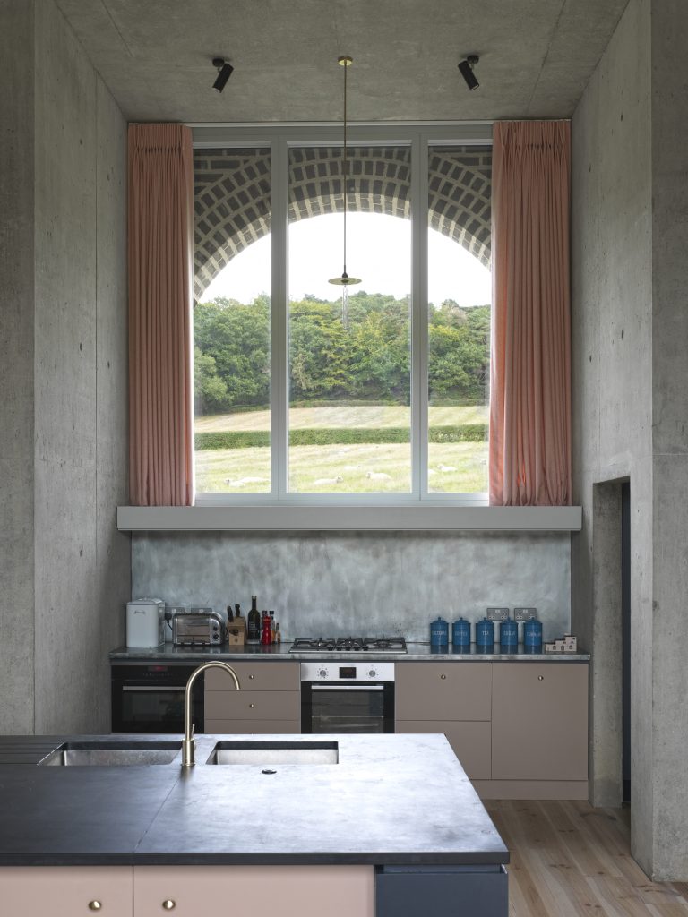 a kitchen with a sink and a window