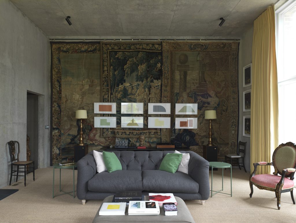 a living room filled with furniture and a fireplace