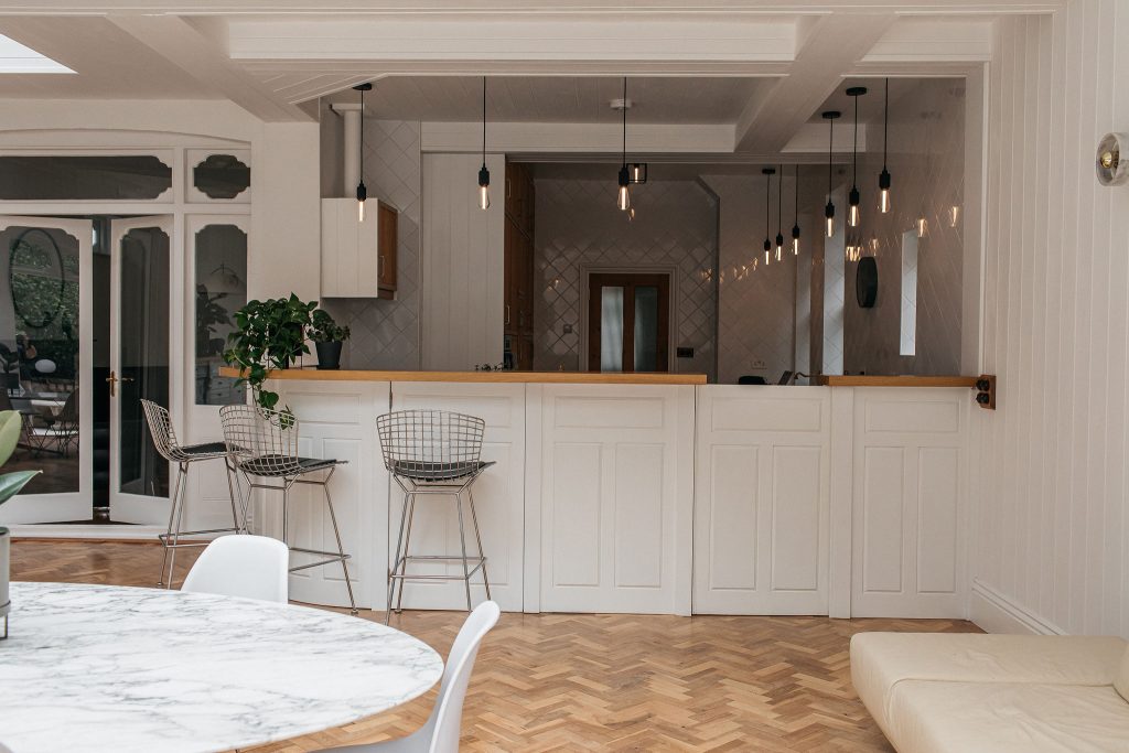 a room filled with furniture and a fireplace