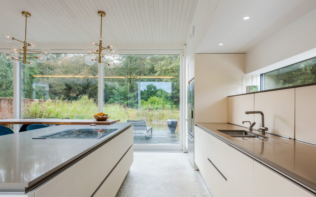 a kitchen with a sink and a window