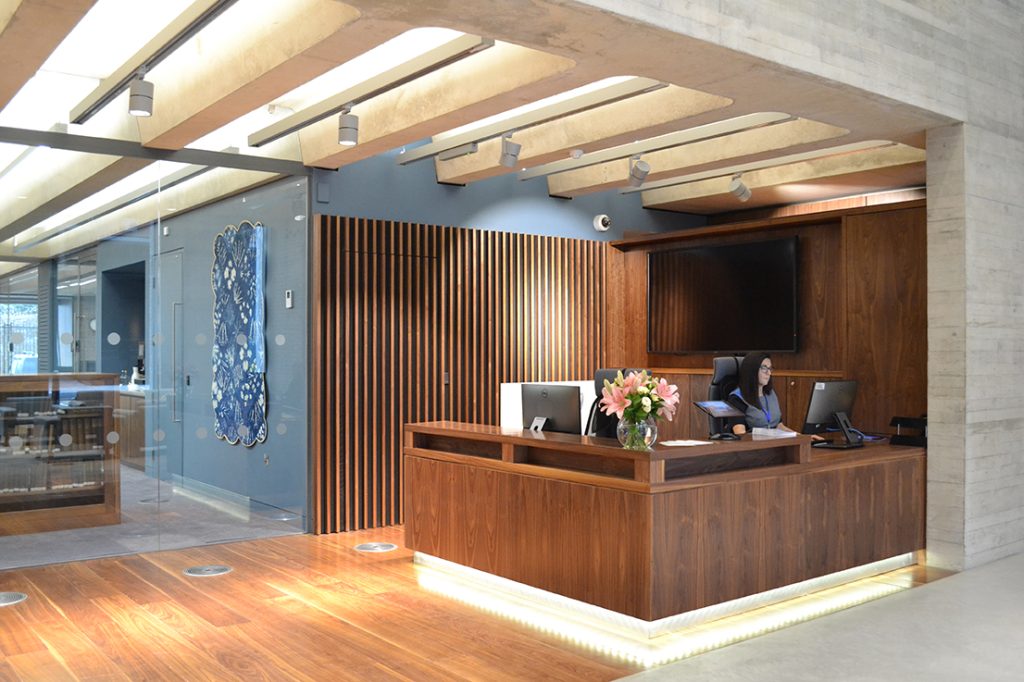 a room filled with furniture and a large window