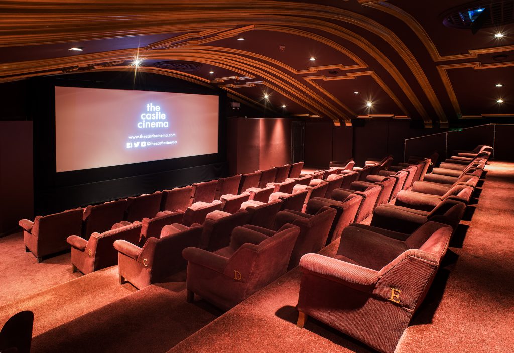 a large room with tables and chairs