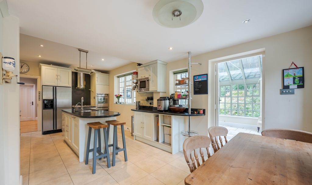 a kitchen with a dining room table