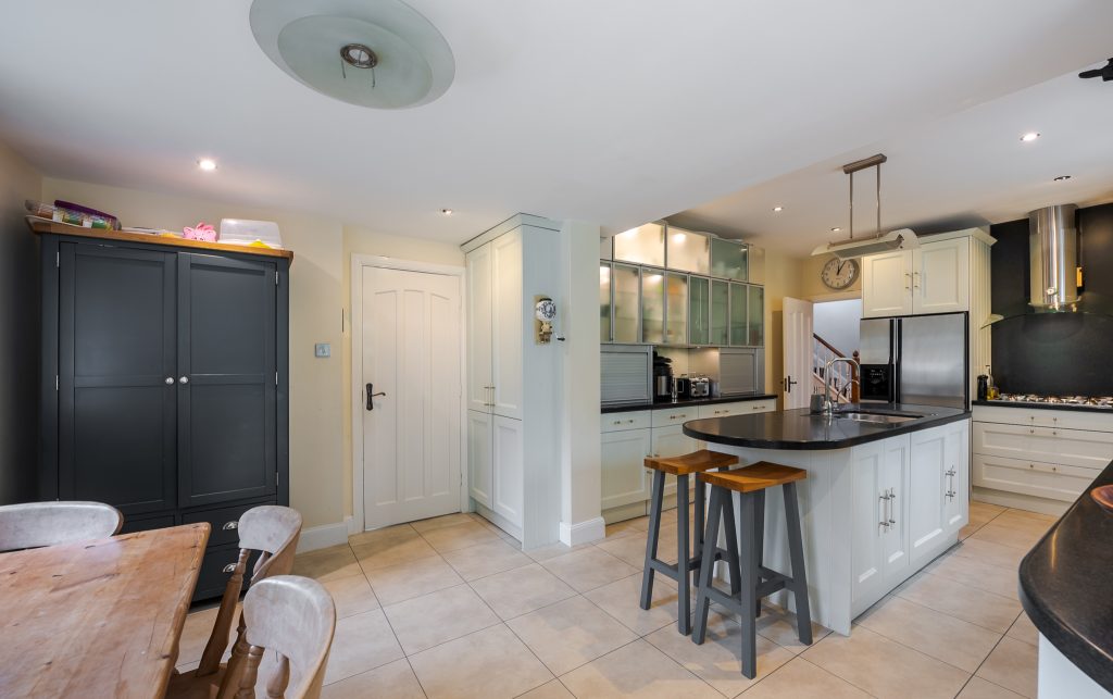 a kitchen with a table in a room