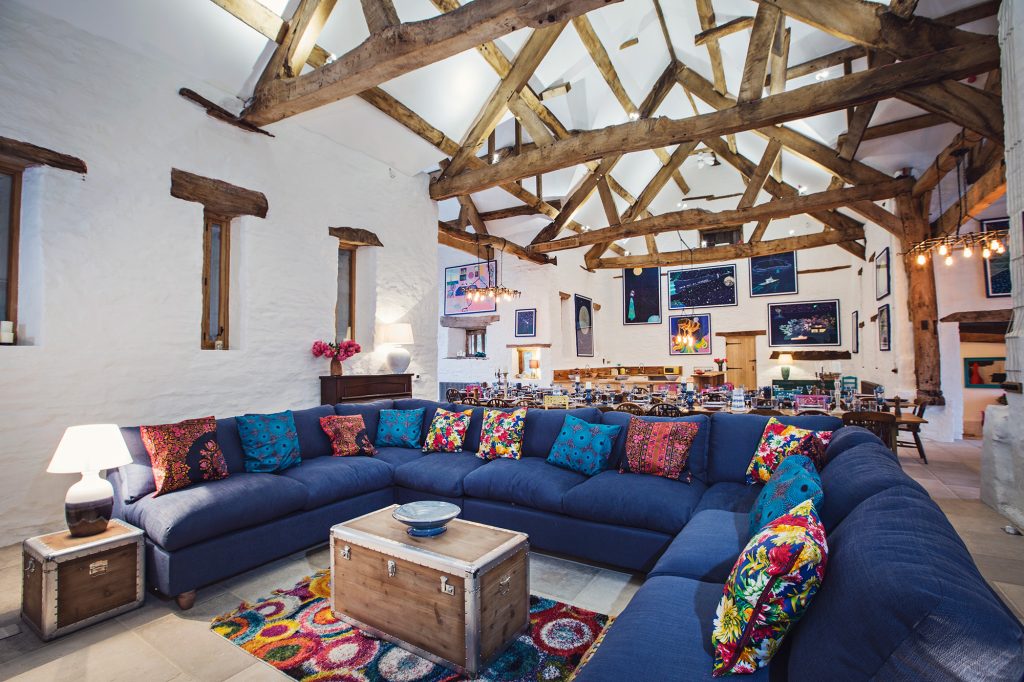 a living room filled with lots of furniture