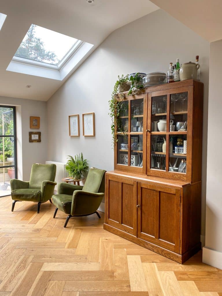 a view of a living room filled with furniture and a fireplace