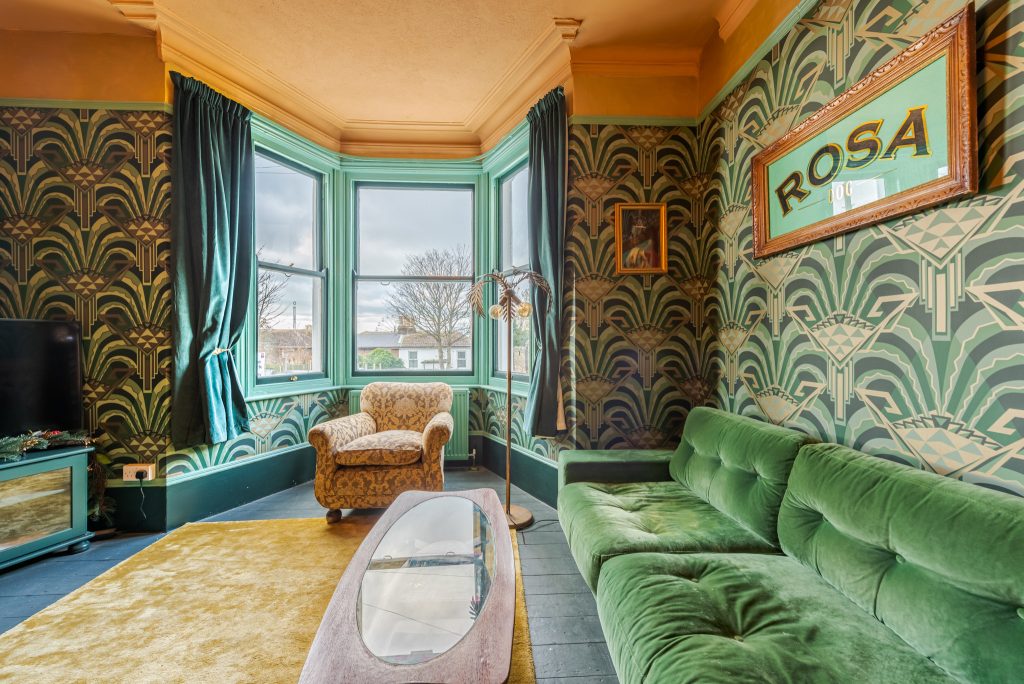 a bedroom with a bed in a room