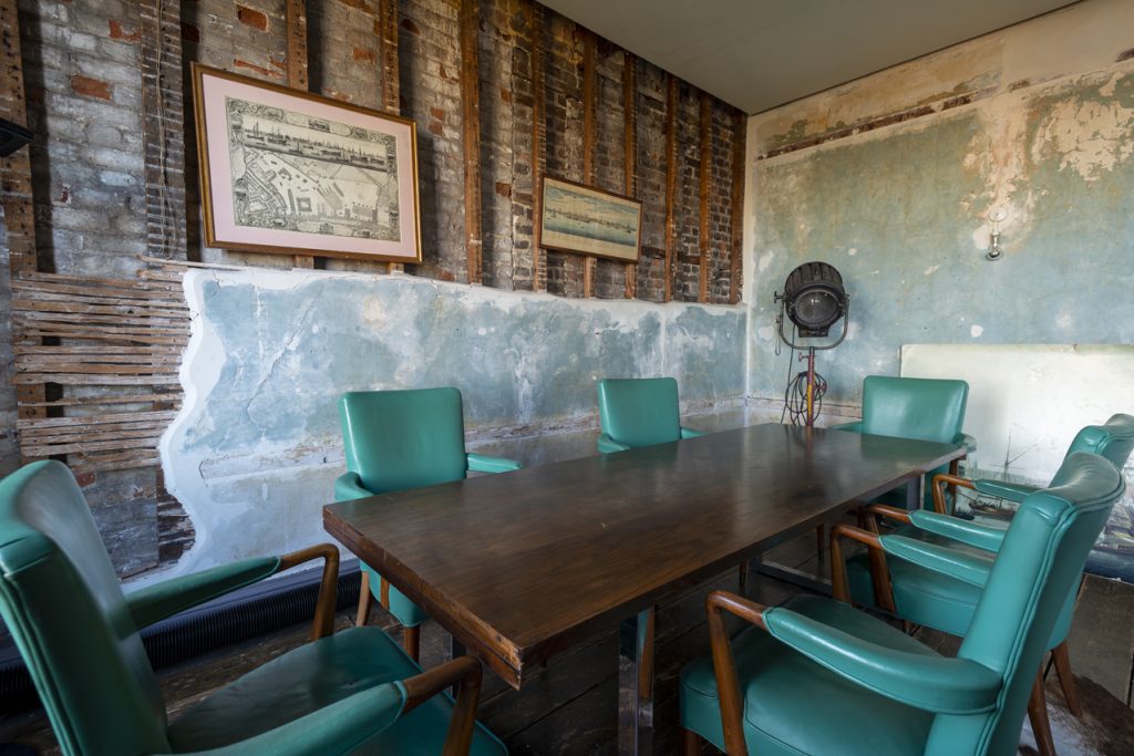 a green chair in a room