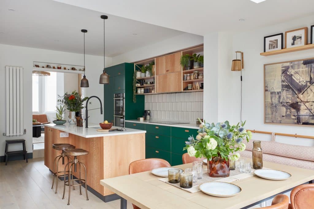 a kitchen with a dining room table