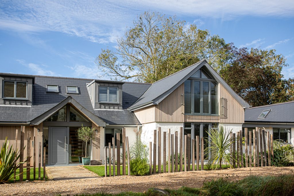 a house with trees in the background