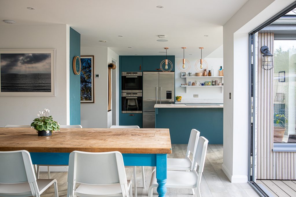 a kitchen with a dining room table