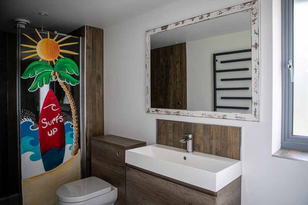 a double sink and large mirror