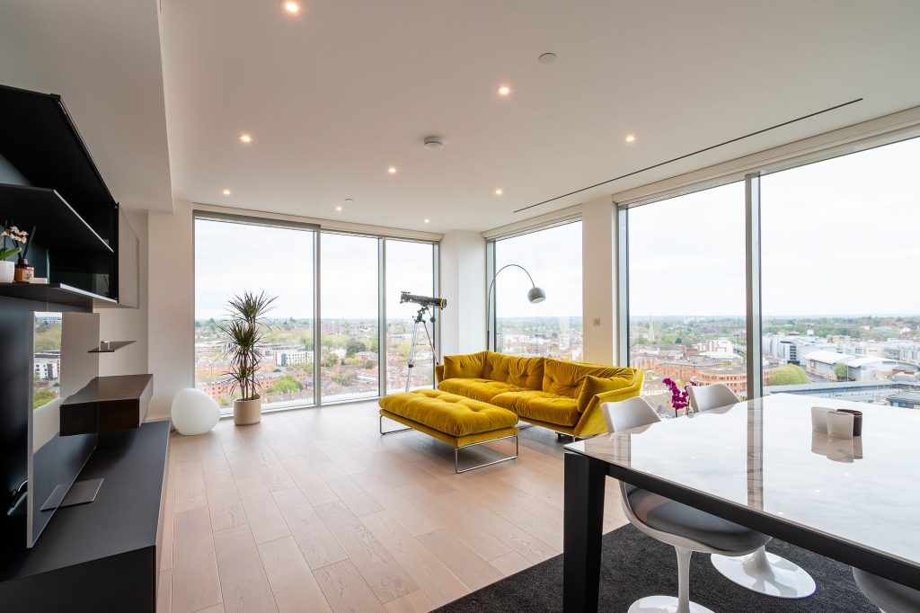 a room filled with furniture and a large window
