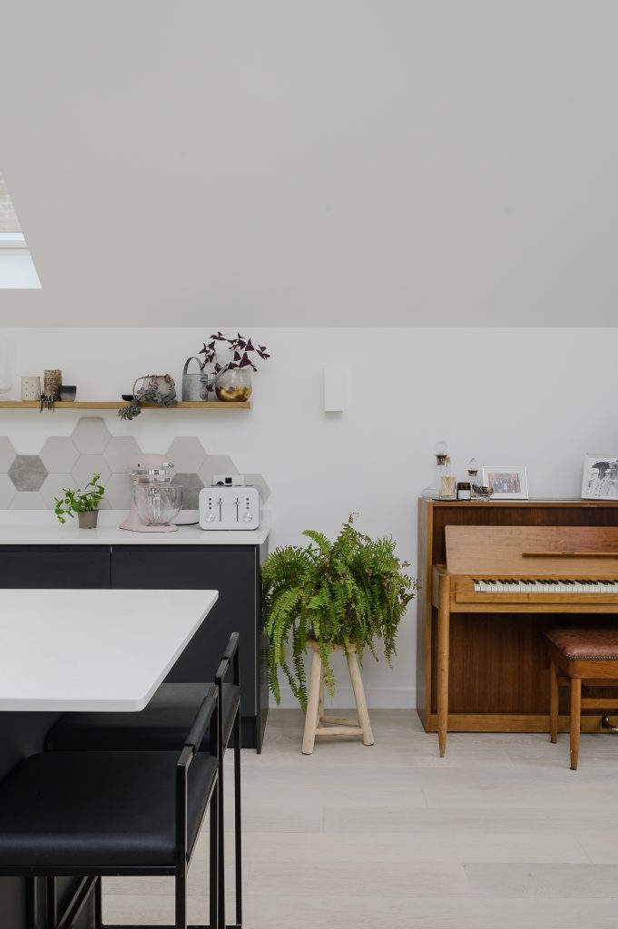 a room filled with furniture and a table
