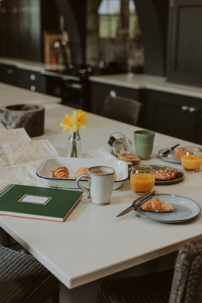 a table topped with plates of food on a plate