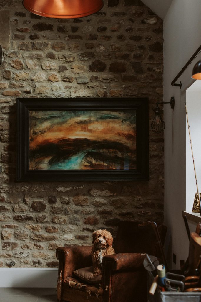 a fire place sitting in a living room with a fireplace