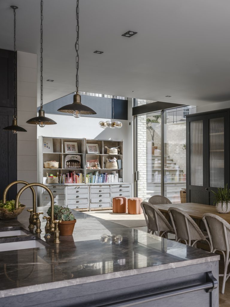 a room filled with furniture and a large window