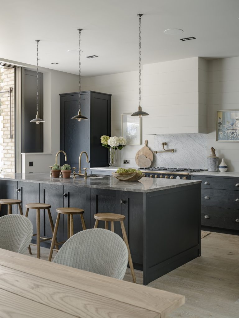 a kitchen with a table in a room