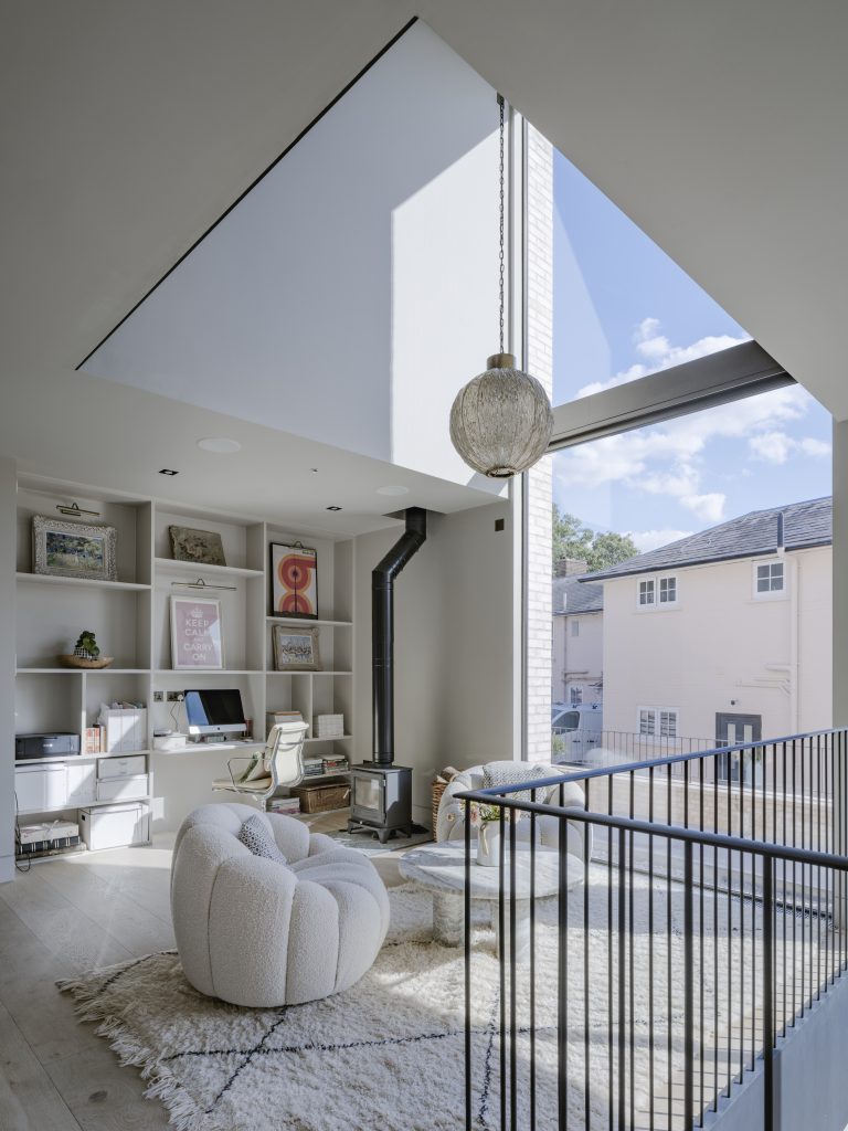 a room filled with furniture and a large window