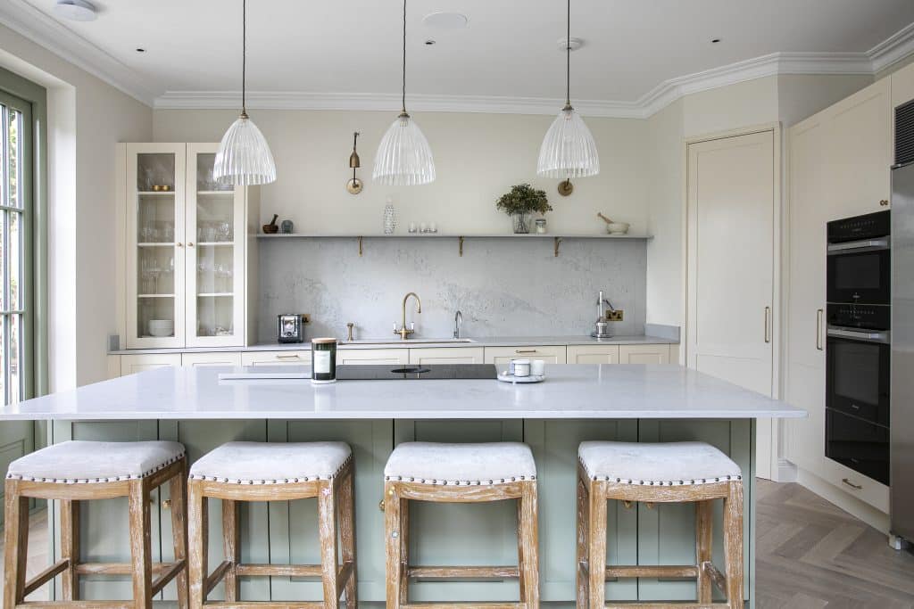 a kitchen filled with lots of furniture