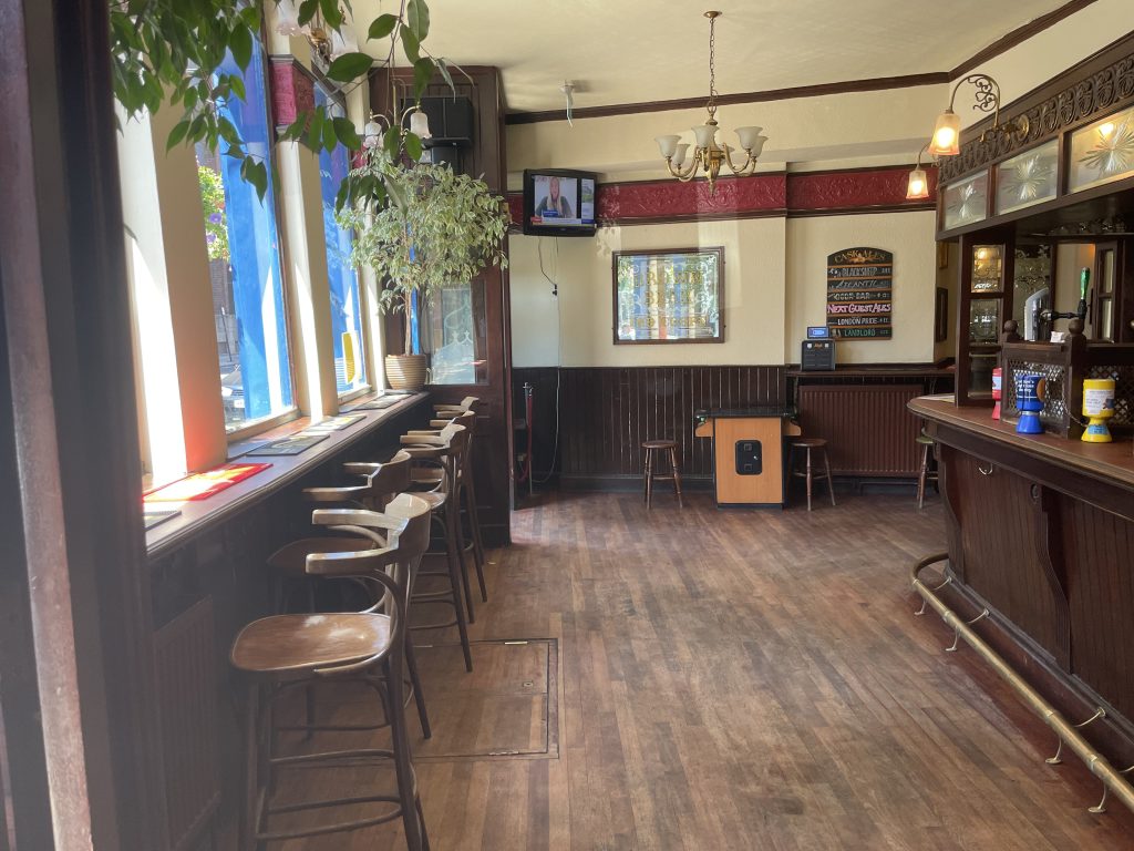 a room filled with furniture and a large window