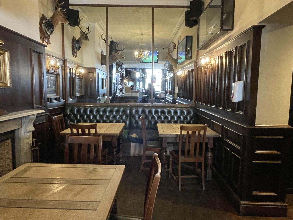 a dining room table in front of a building