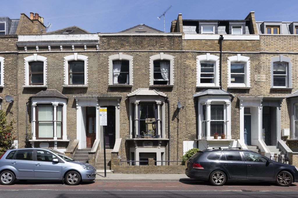 a car parked in front of a building