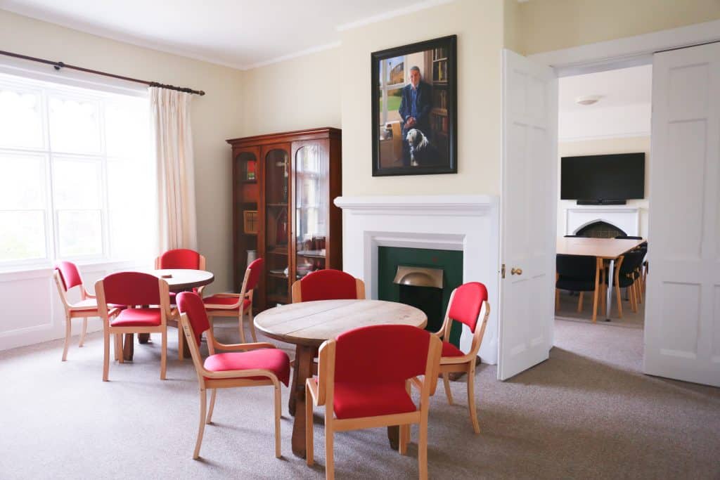 a living room filled with furniture and a table