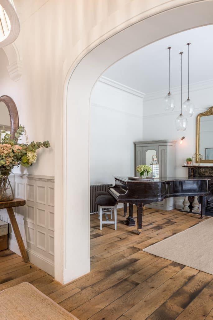 a room filled with furniture and a large window
