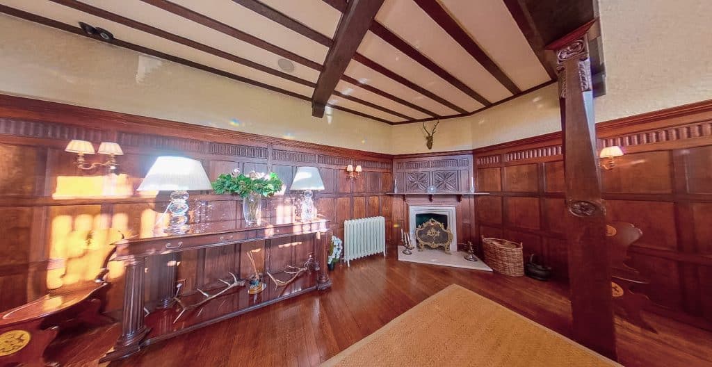 a room filled with furniture and a fireplace