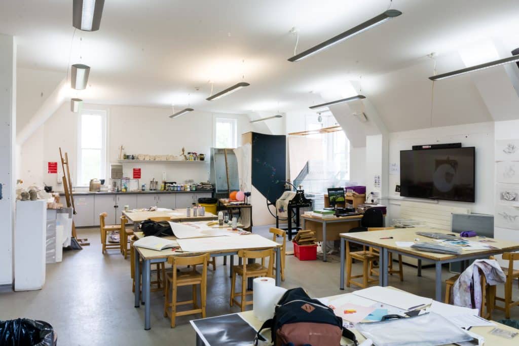a kitchen filled with lots of furniture