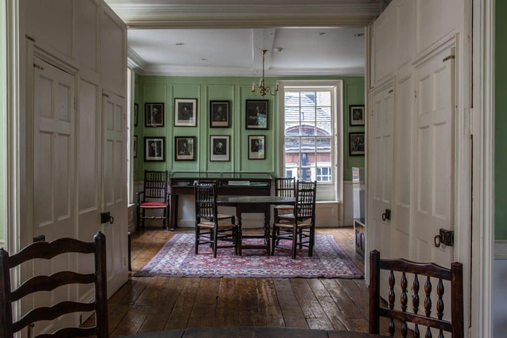 a dining room table in front of a window