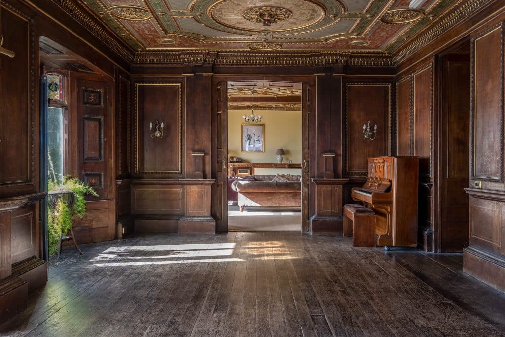 a room filled with furniture and a large building