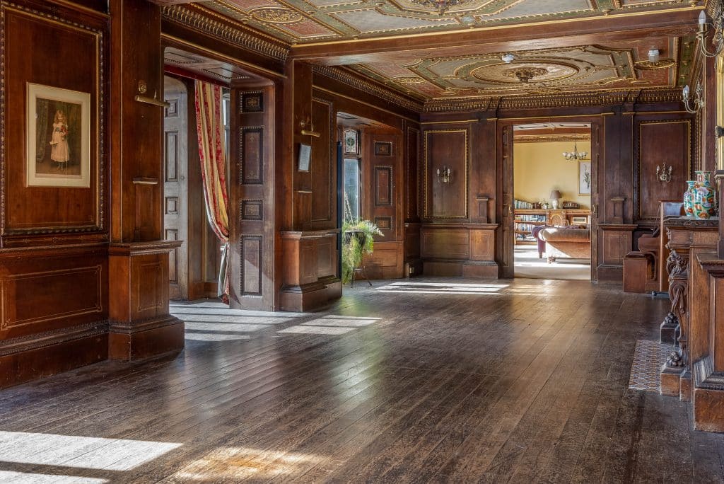 a room filled with furniture and a large building